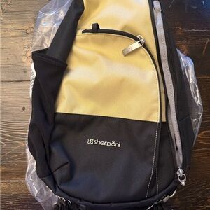 Sherpani Black and Cream convertible backpack